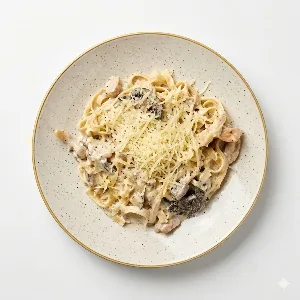 Паста с куриной грудкой и грибами в сливочном соусе